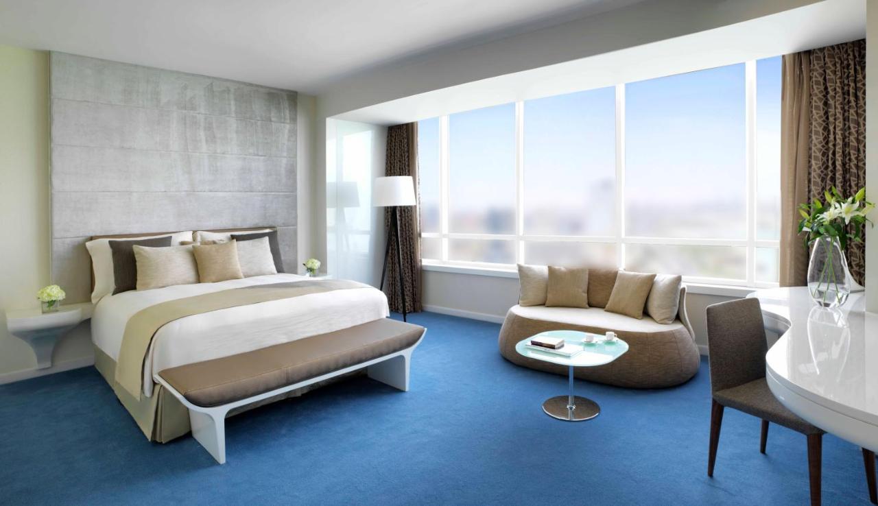 Symphony Style Hotel Kuwait Salmiya Exterior photo A bedroom at the hotel