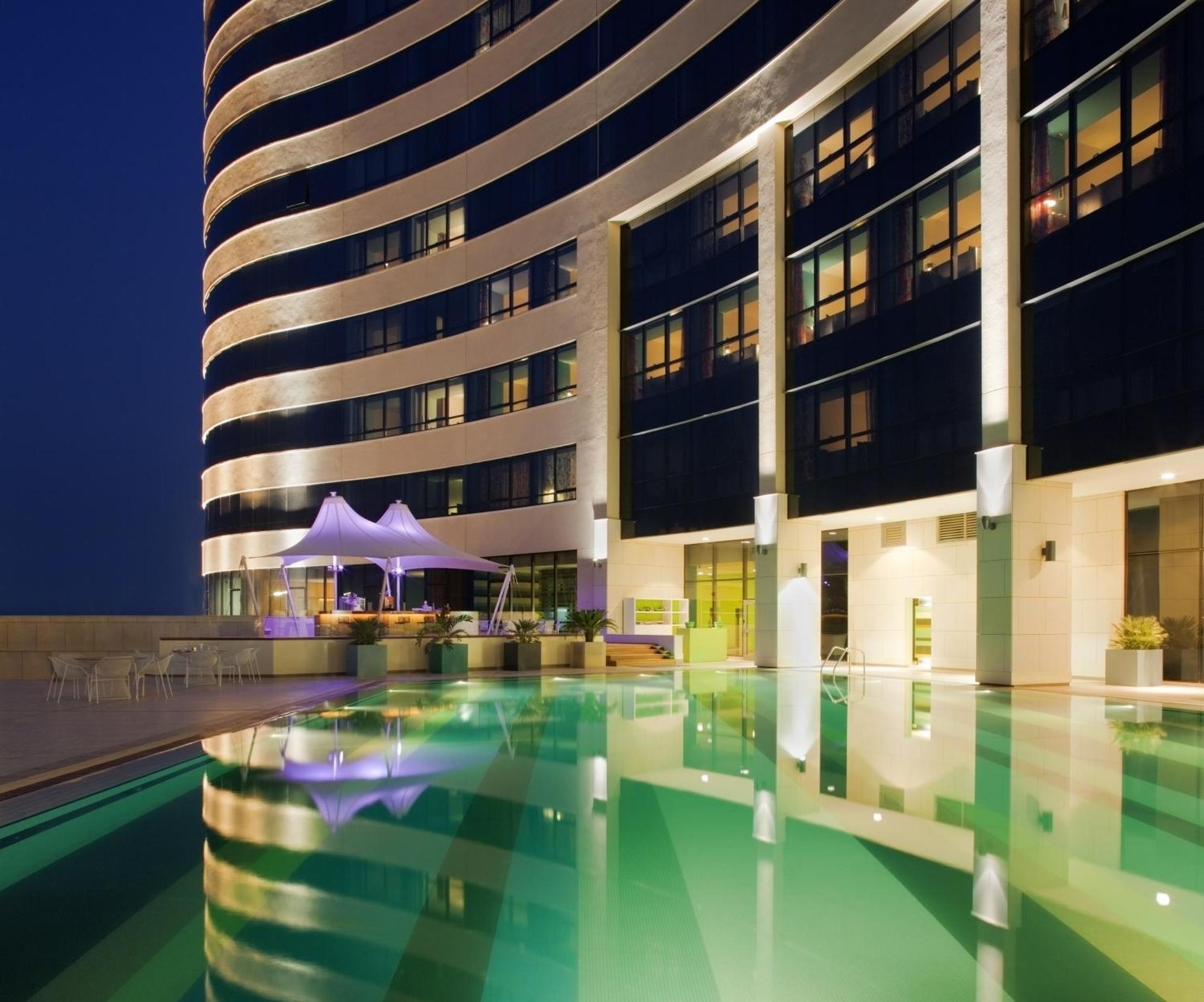Symphony Style Hotel Kuwait Salmiya Exterior photo The swimming pool at the hotel