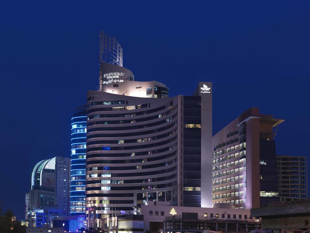 Symphony Style Hotel Kuwait Salmiya Exterior photo The hotel at night