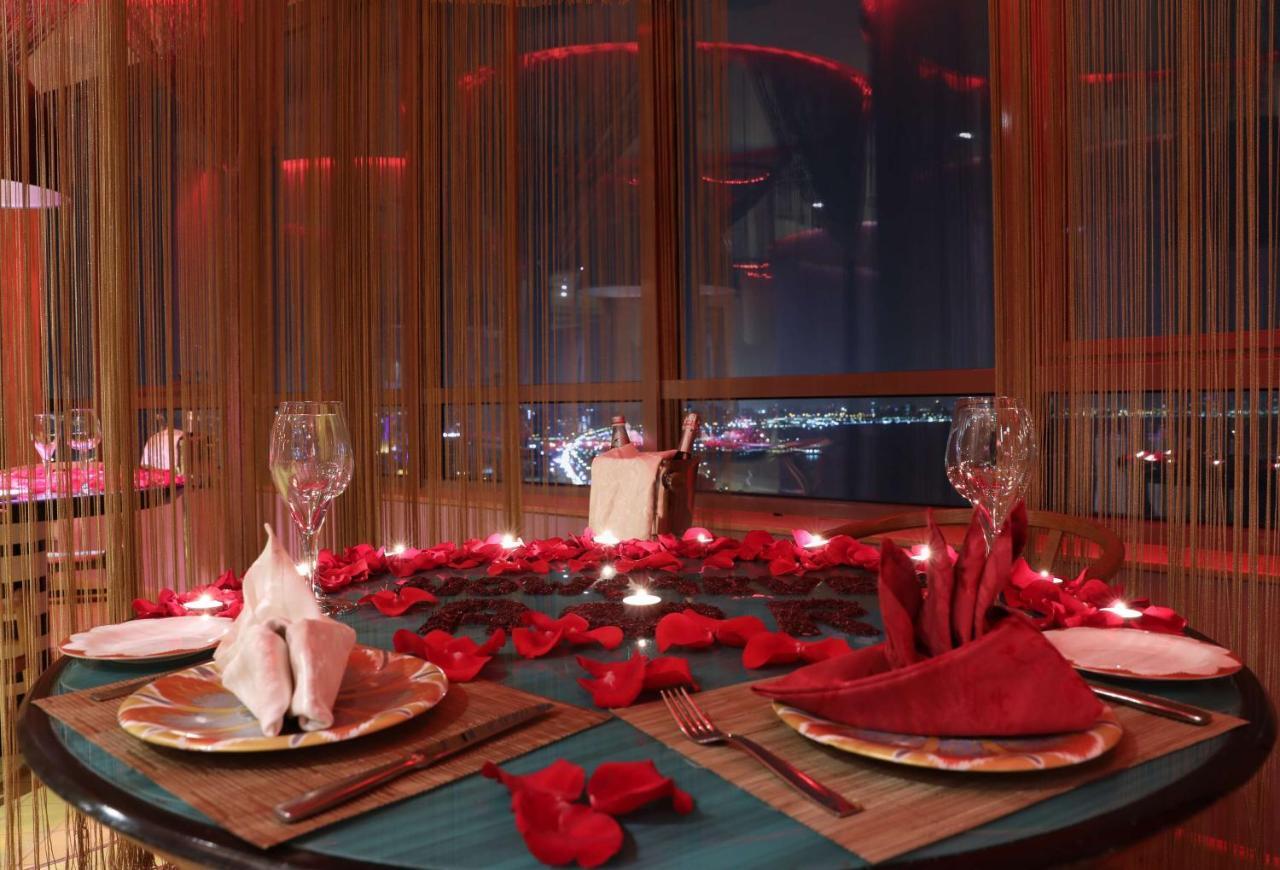Symphony Style Hotel Kuwait Salmiya Exterior photo A table set for a romantic dinner